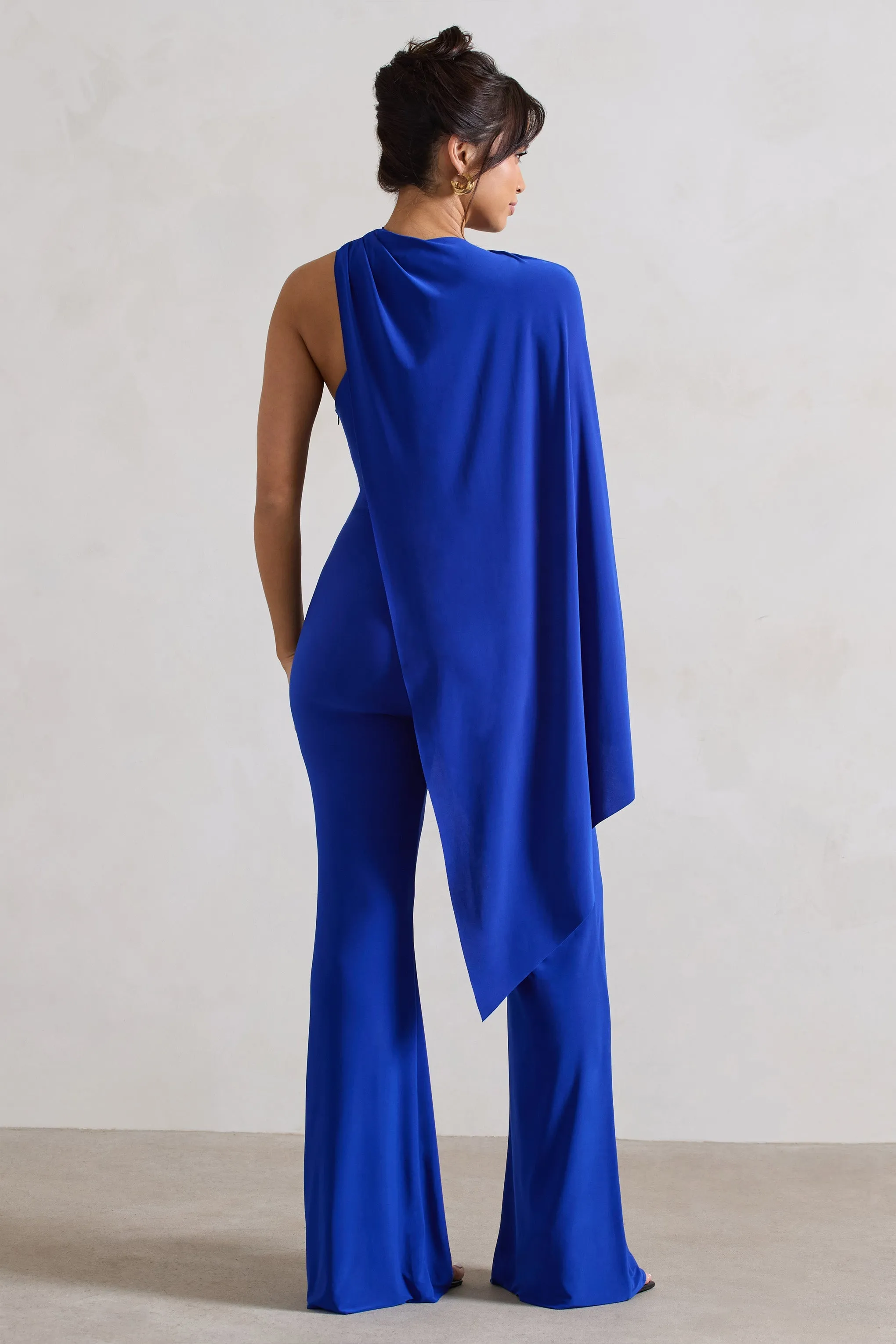 Offset | Royal Blue Asymmetric Flared-Leg Jumpsuit With Cape Sleeve